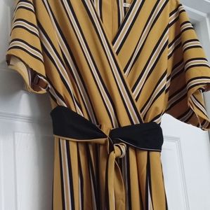Ladies size medium jumpsuit. Est.1945 brand gold BLK striped.